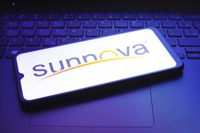 The Sunnova Energy International, Inc. logo appears on a smartphone screen