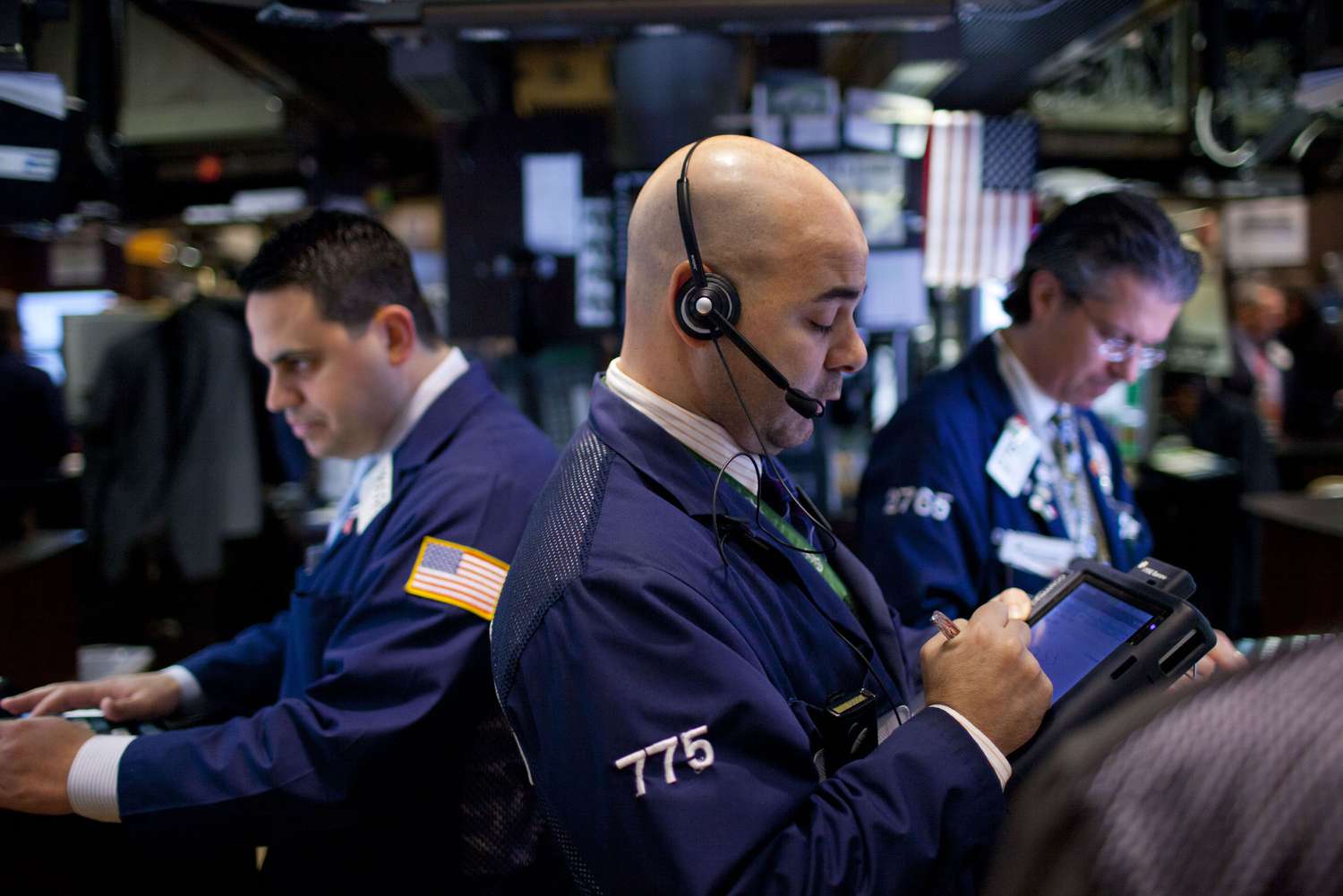 Traders on the floor of the NYSE
