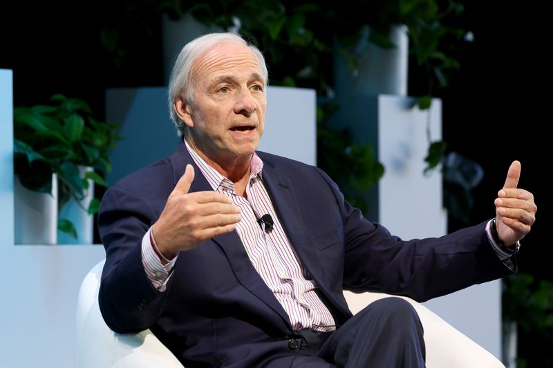 Ray Daliio seated while speaking to a New York City audience in 2024.