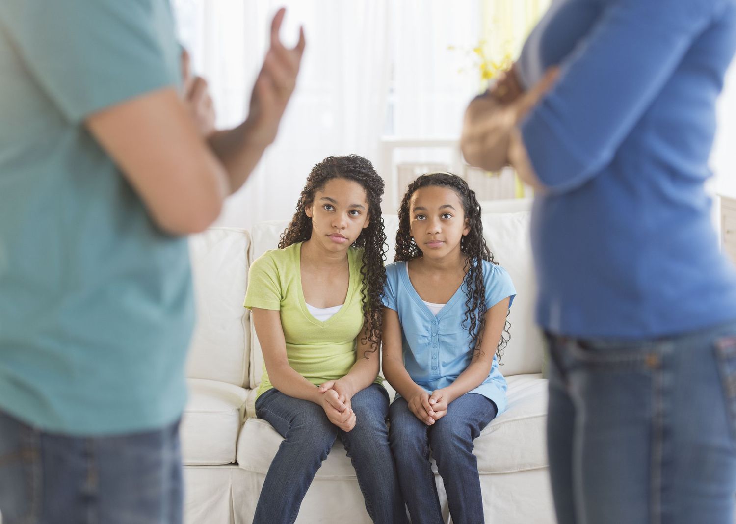 Children with arguing adults