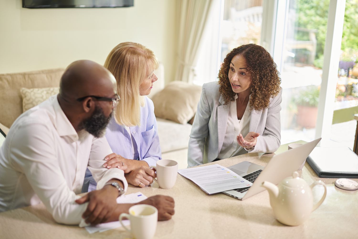 Financial advisor discussing benefits of a tax-free savings account with clients.