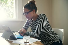 Woman comparing personal loans on her computer
