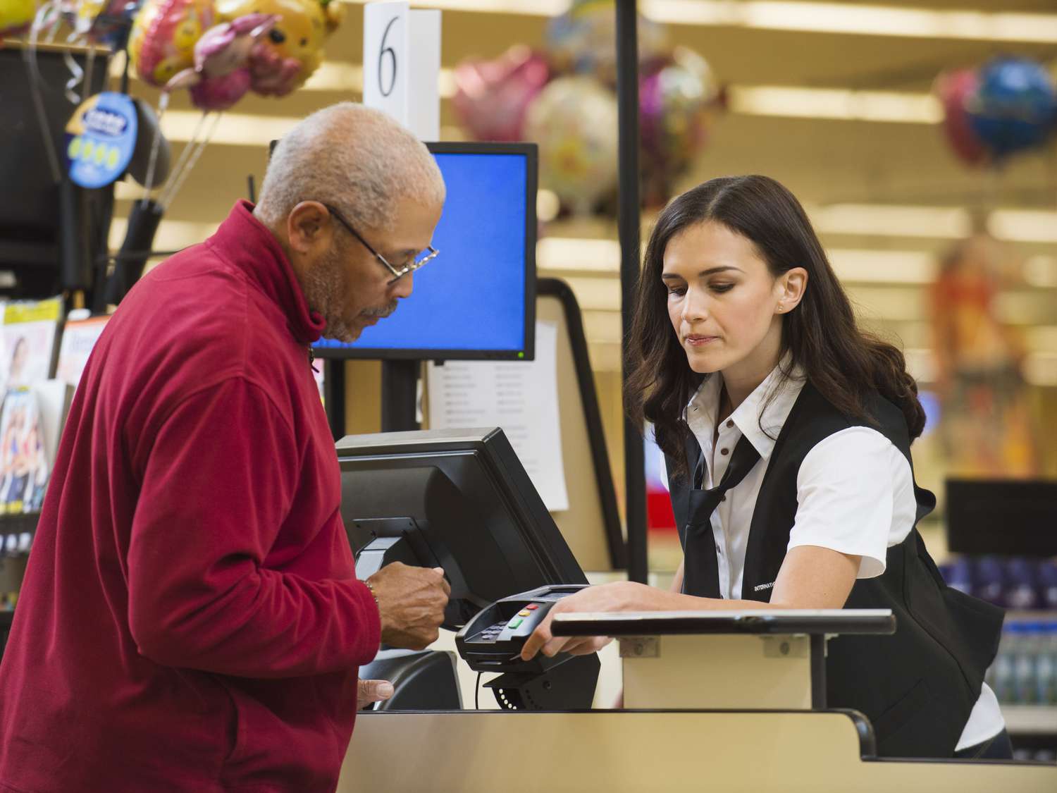 A customer pays for a purchase with a credit card.