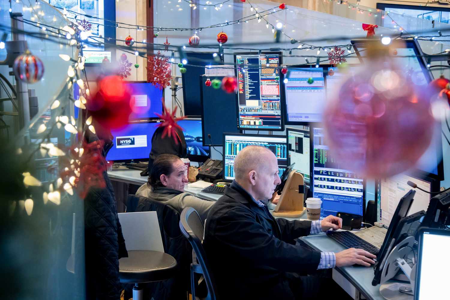 Traders work on the floor of the New York Stock Exchange