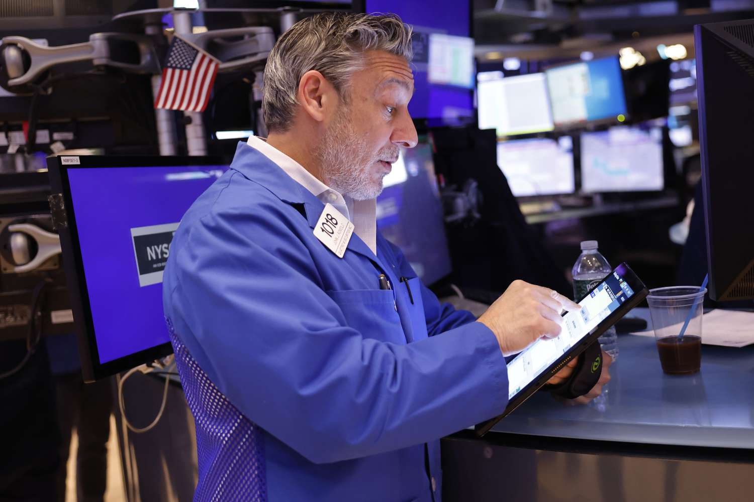 Traders work on the floor of the New York Stock Exchange.