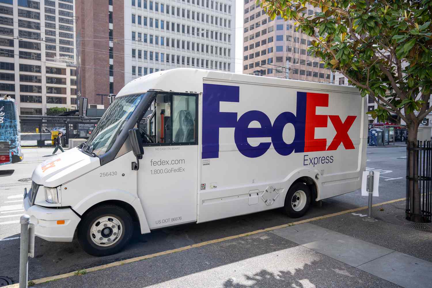 FedEx Express delivery truck parked on a city street.
