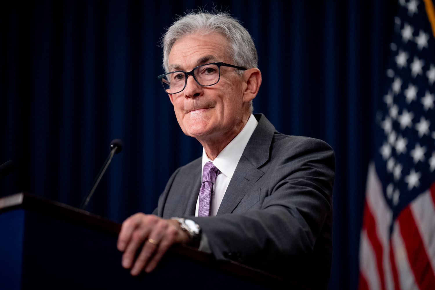 Federal Reserve Chairman Jerome Powell takes a question from a reporter at a news conference.