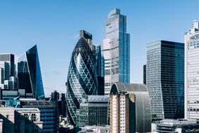 Picture of buildings in the City of London's financial district including the Gherkin building.