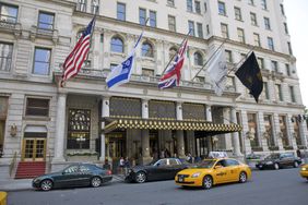 Facade of the Plaza Hotel, New York, NY. Henry J. Hardenbergh, architect, completed 1909 in Second Empire Baroque style, at Grand Army Plaza, Fifth Avenue at 59th Street
