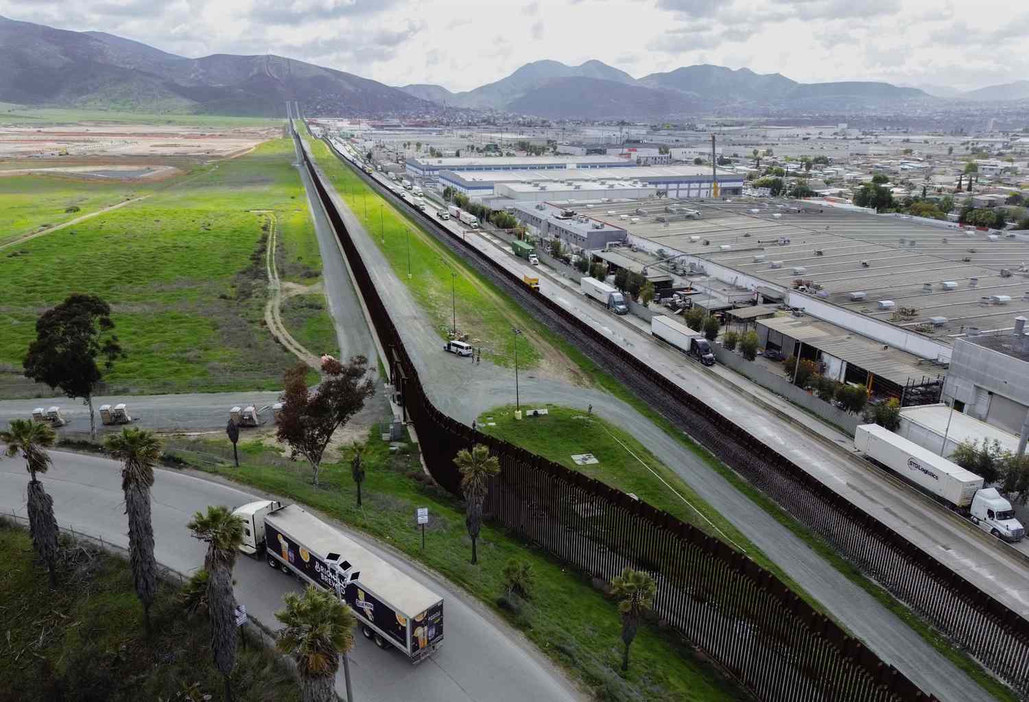 Trucks coming from Mexico enter the United States to an inspection station after crossing the border in Otay Mesa, California, on April 1, 2025.