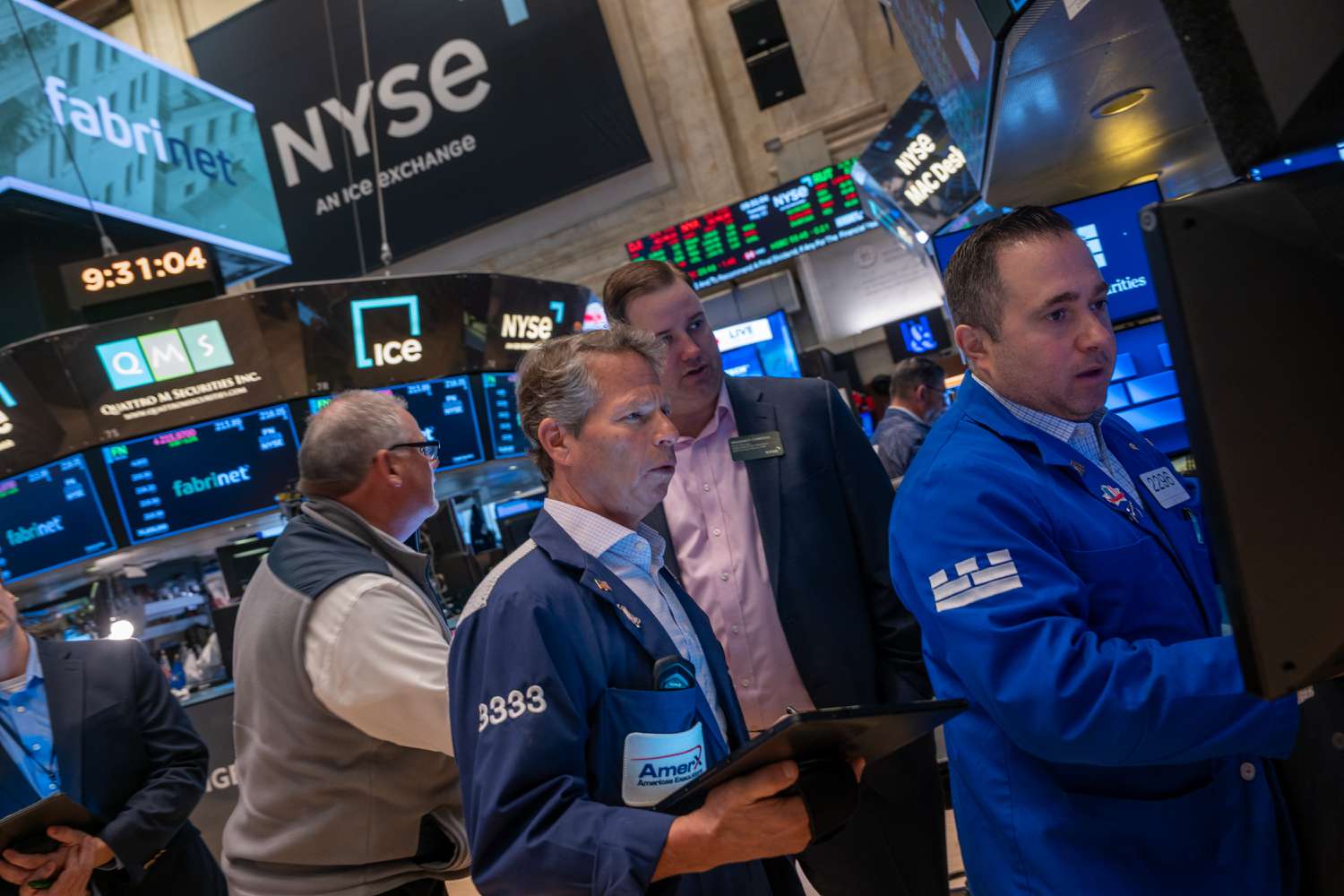 Traders work on the floor of the New York Stock Exchange (NYSE) on May 13, 2025 in New York City.