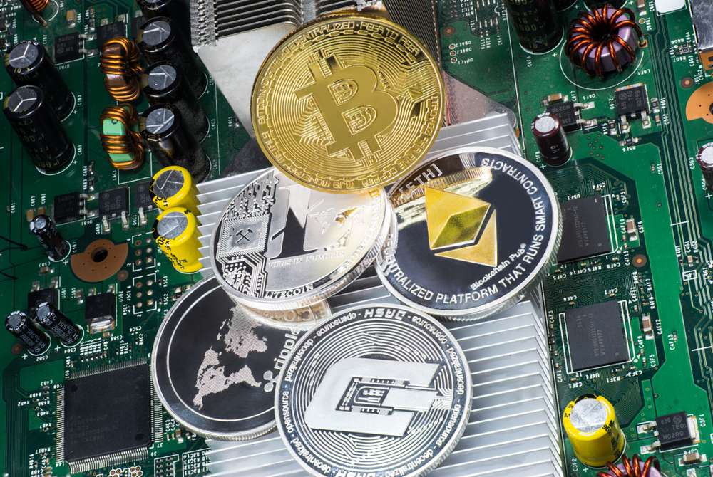 Cryptocurrency tokens on a motherboard