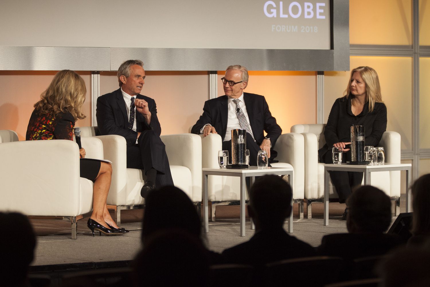 A venture capital conference with investors onstage to discuss funding various initiatives