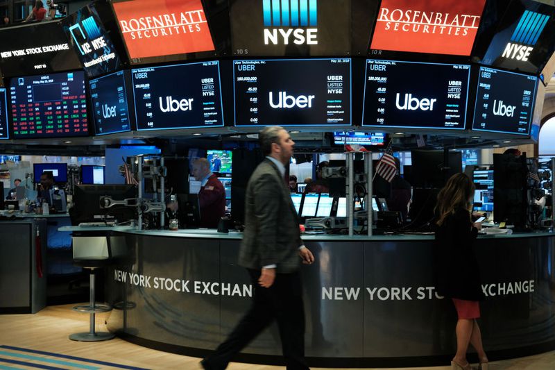 NEW YORK, NEW YORK - MAY 10: Traders work on the floor of the New York Stock Exchange (NYSE) before the Opening Bell at the NYSE as the ride-hailing company Uber makes its highly anticipated initial public offering (IPO) on May 10, 2019 in New York City. Uber will start trading on the New York Stock Exchange after raising $8.1 billion in the biggest U.S. IPO in five years.Thousands of Uber and other app based drivers protested around the country on Wednesday to demand better pay and working conditions including sick leave, overtime and a minimum wage.