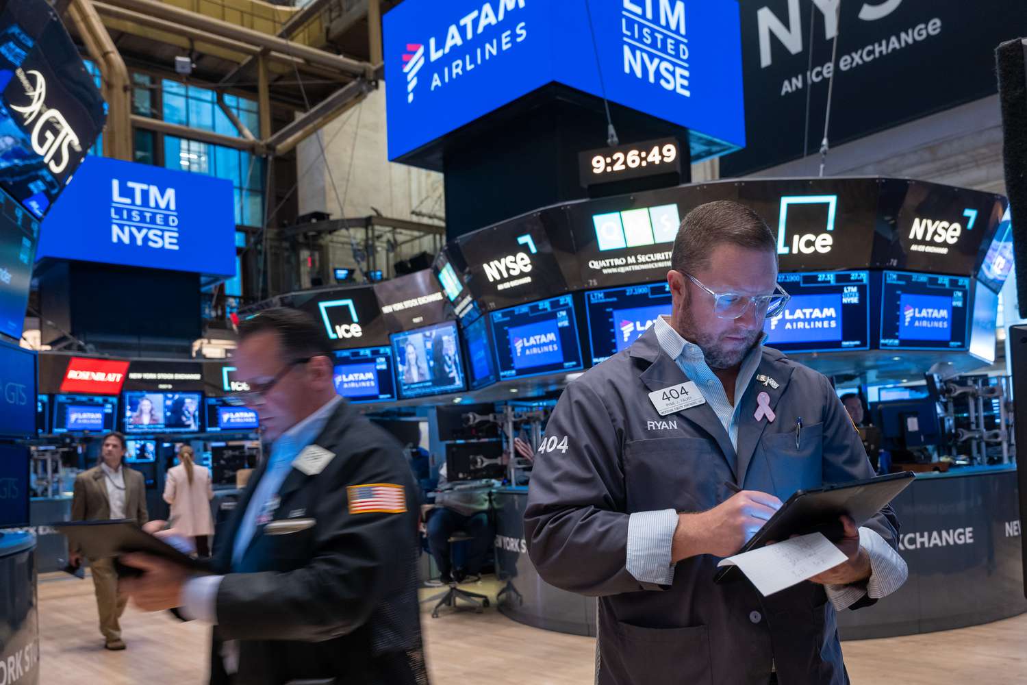 Traders work on the floor of the New York Stock Exchange