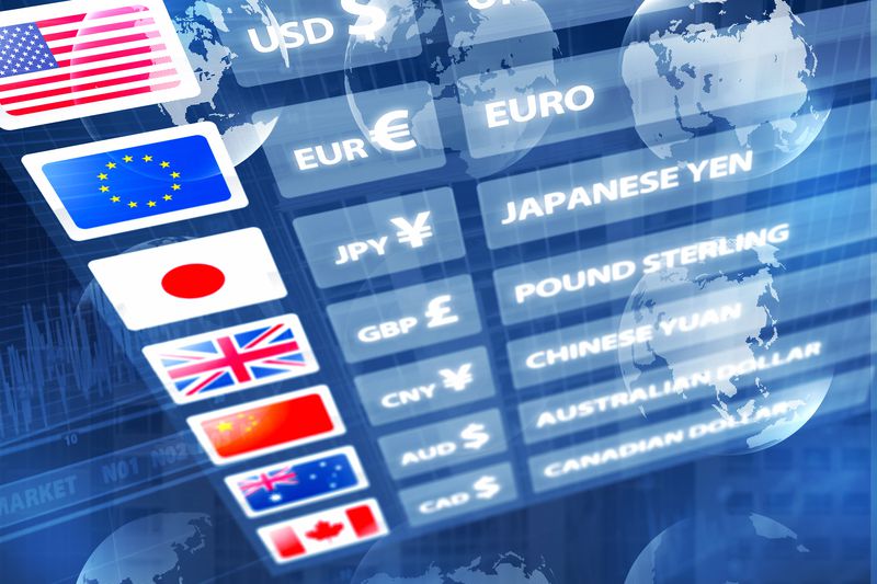 Currency exchange board showing exchange rates for U.S. dollar, the Euro, the Japanese Yen, and other currencies. 
