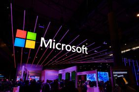 Microsoft logo on display at a pavilion.