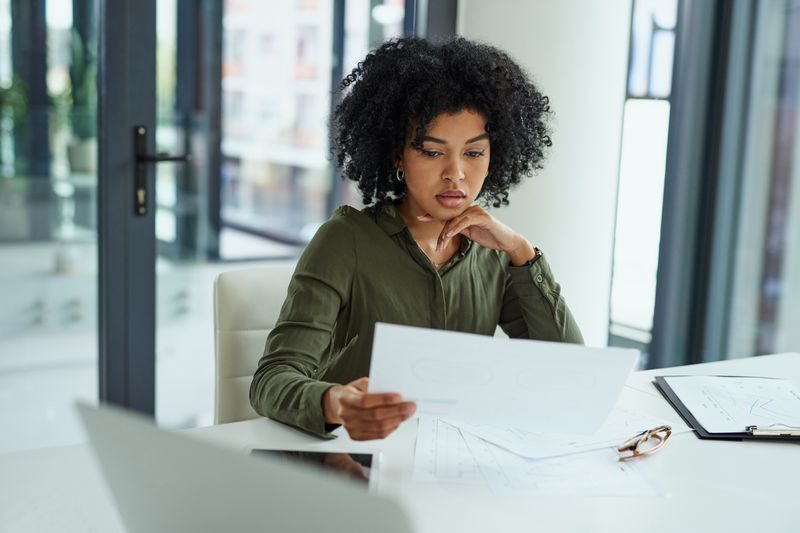 Woman reading documents.