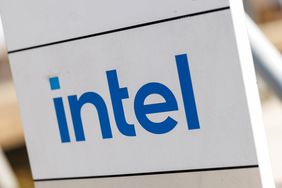The blue Intel logo is seen on a white sign.