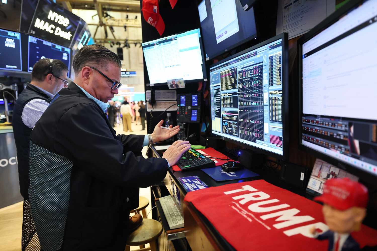 Traders work on the floor of the New York Stock Exchange 