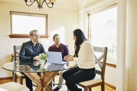 couple in discussion with financial advisor