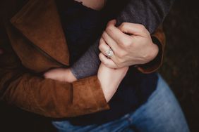 A couple with an engagement ring