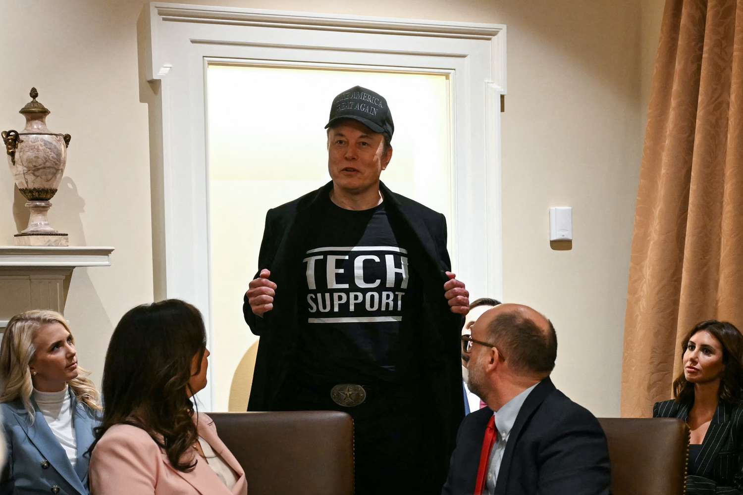 Elon Musk at a cabinet meeting.