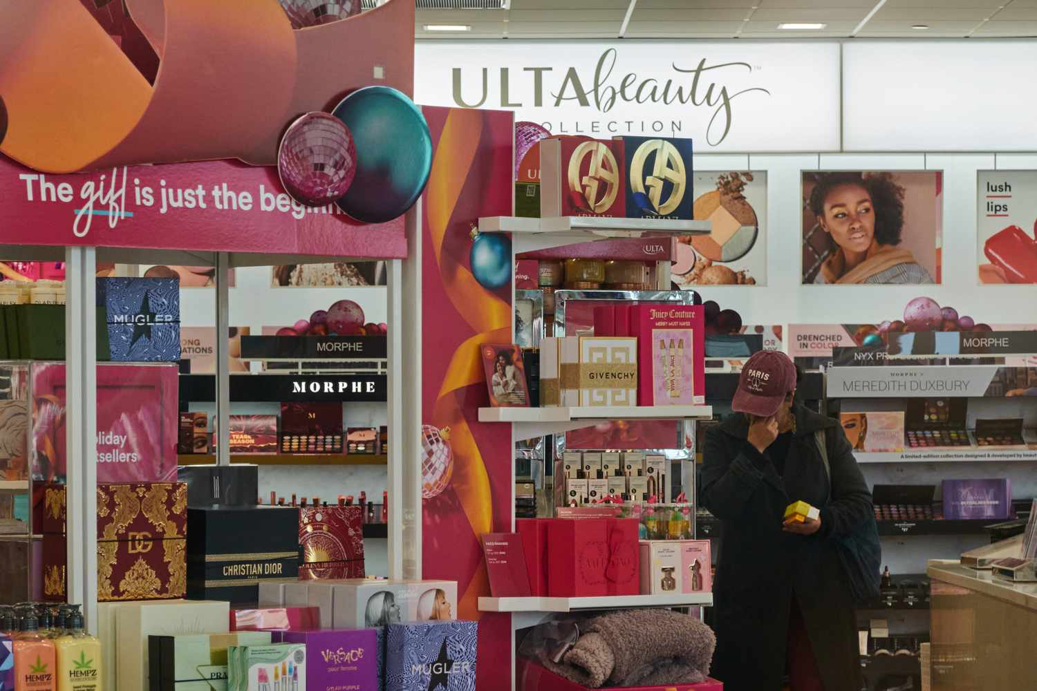 A customer walks through an Ulta.