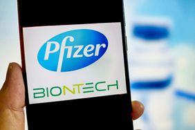 Pfizer and BioNTech logos on a smartphone 