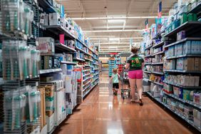 A family shops in an Austin, Texas, Walmart store in May. 