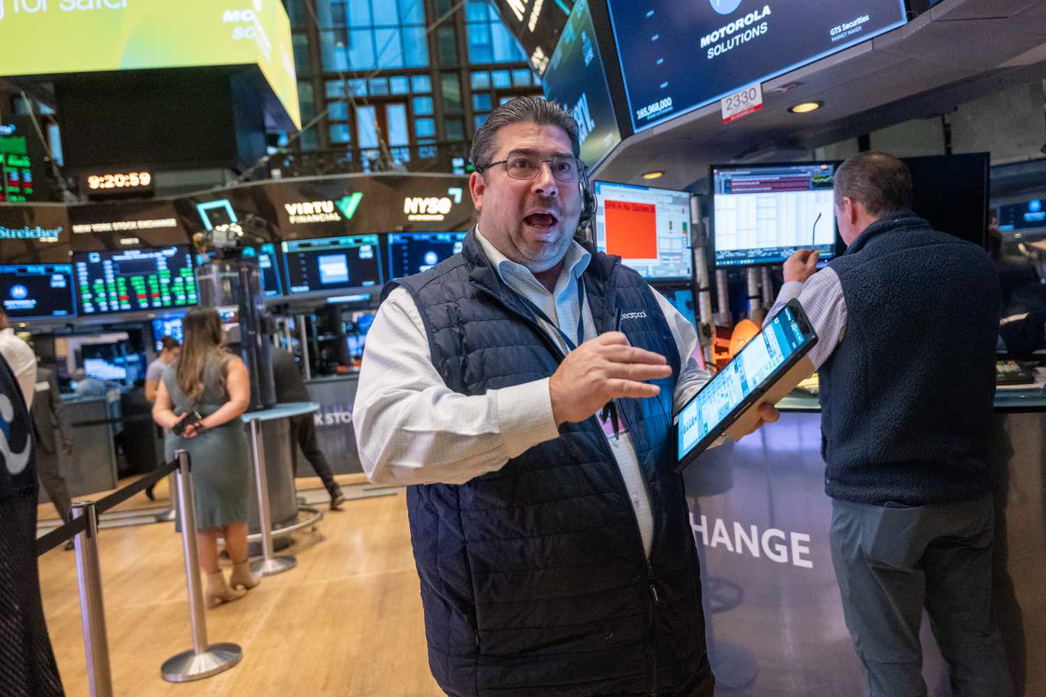Traders work on the floor of the New York Stock Exchange (NYSE).