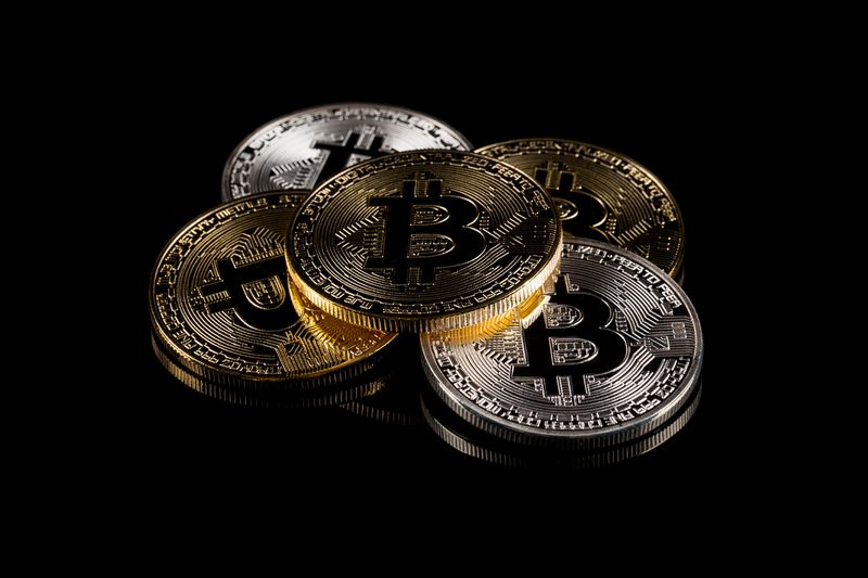 Physical version of Bitcoin coin, aka virtual money.
