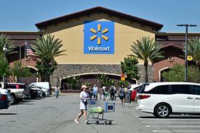 People shop at a Walmart in California ahead of the company's May 15, 2025 scheduled earnings report.