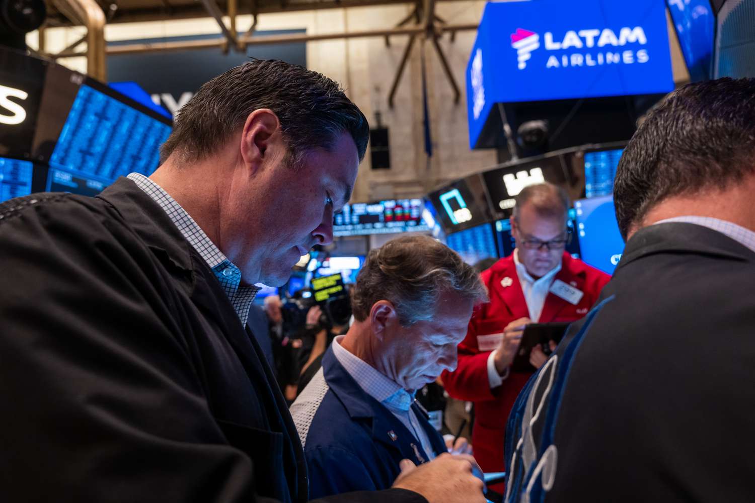 Traders work on the floor of the New York Stock Exchange