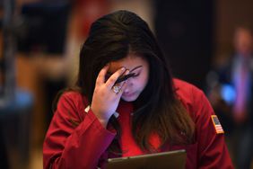 A trader reacts during the opening bell at the New York Stock Exchange (NYSE) on February 28, 2020 at Wall Street in New York City. 