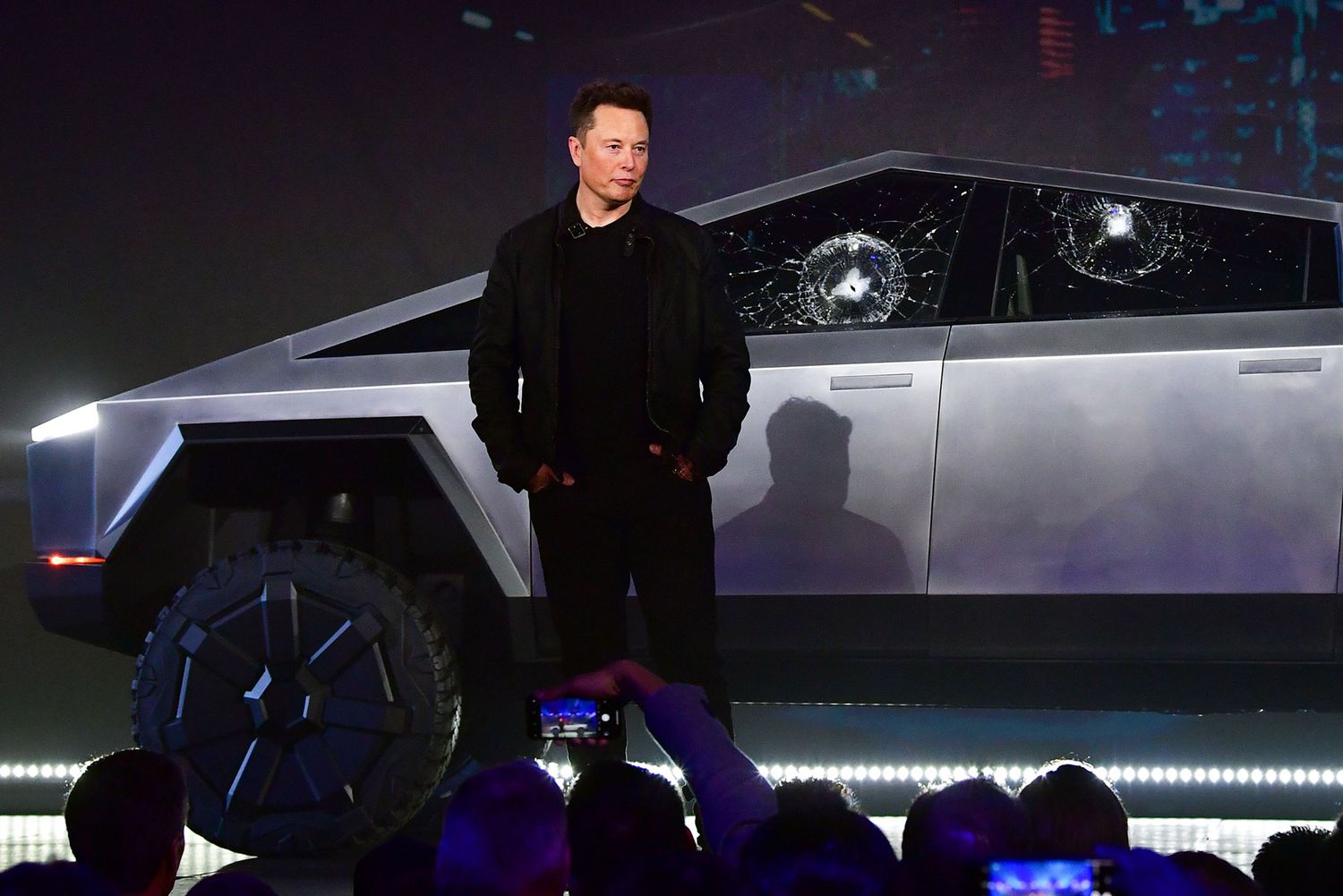 Elon Musk stands in front of the newly unveiled Tesla's Cybertruck at Tesla Design Center