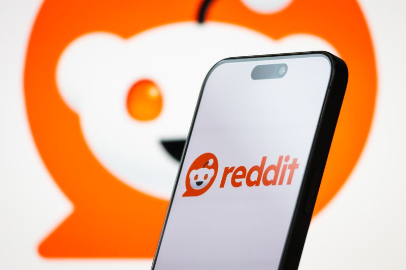 Reddit logo displayed on a smartphone screen.