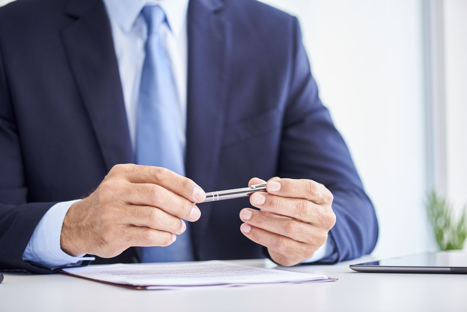 A man holding a pen
