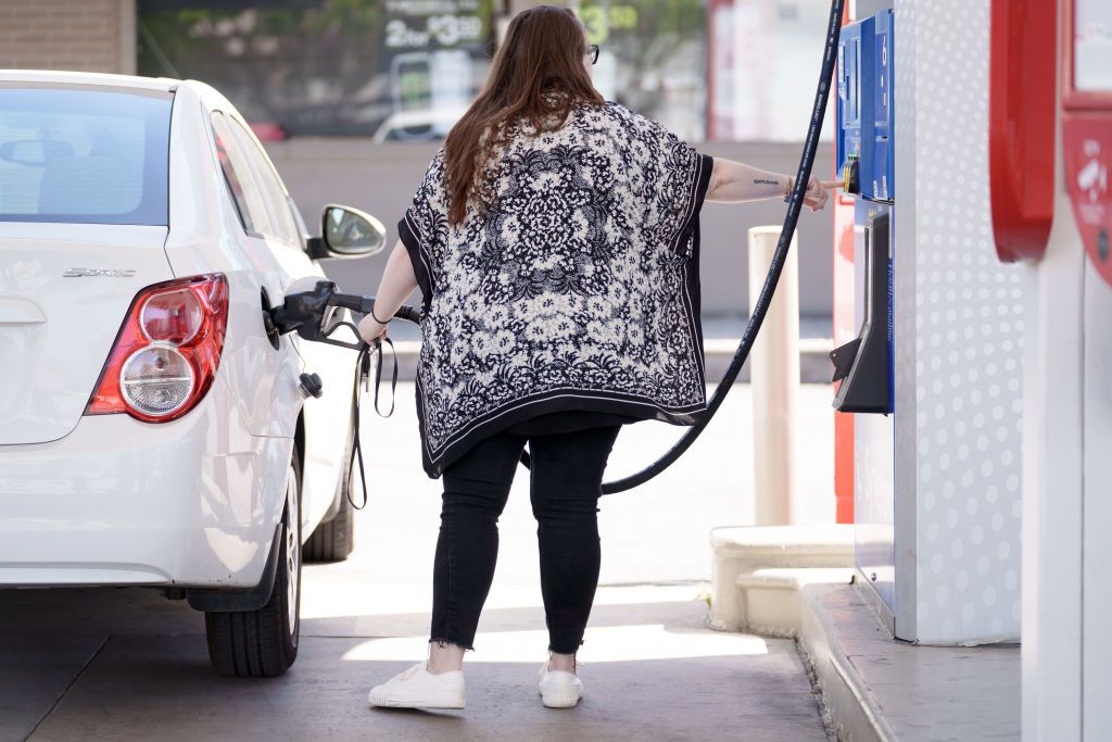 A customer refuels a vehicle at a Mobil gas station in Los Angeles, California, US, on Tuesday, April 2, 2024.