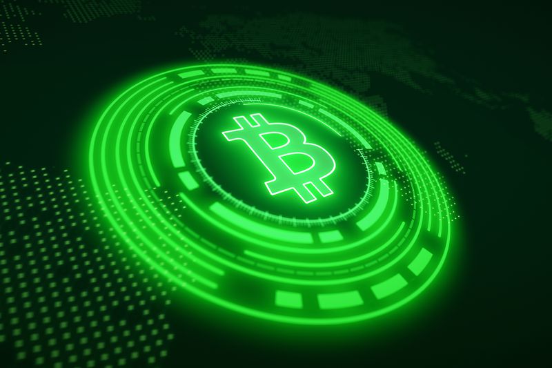 An illustration of a bitcoin logo in green on a dark background. 