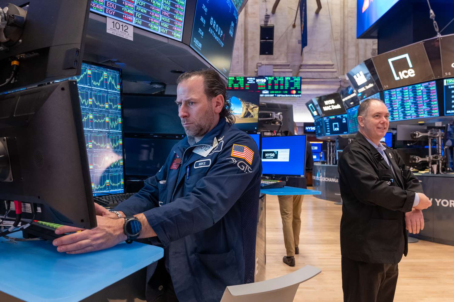 Traders work on the floor of the New York Stock Exchange (NYSE) on January 19, 2024.