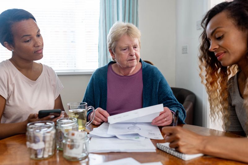 Individuals looking at their finances