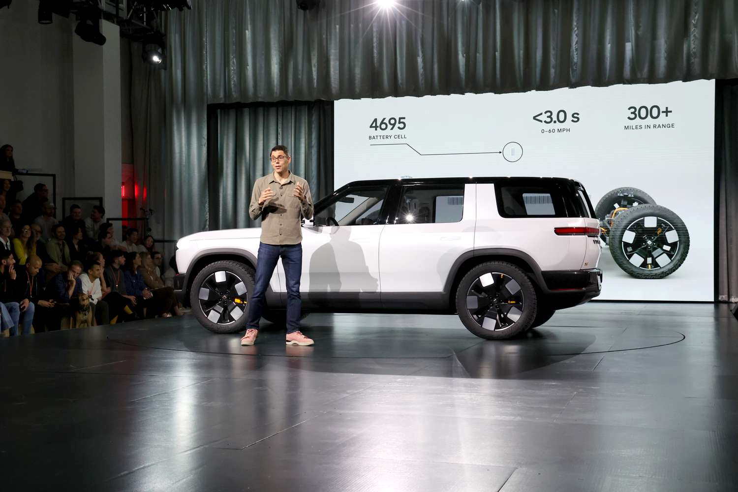 Rivian CEO RJ Scaringe speaks onstage during the Rivian Reveals All-Electric R2 Midsize SUV event at Rivian South Coast Theater on March 07, 2024 in Laguna Beach, California. 
