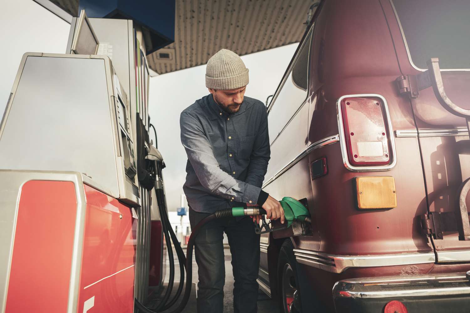 Man pumping gas