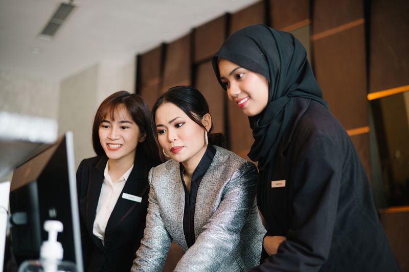 Business professionals at a computer