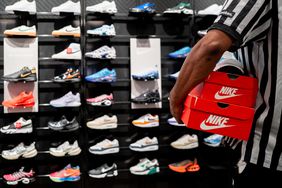 Nike shoes on display at a Foot Locker store