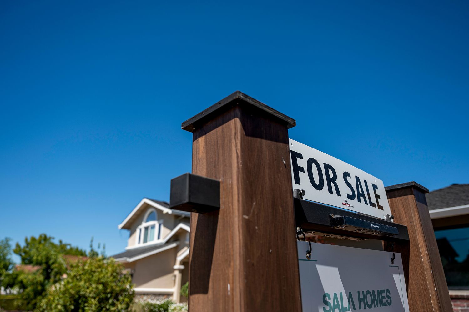 A "For Sale" sign in front of a home in San Jose, California, US, on Thursday, Sept. 5, 2024.