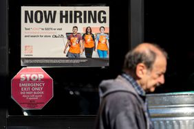 "Now Hiring" signage outside a Home Depot store in San Carlos, California, on Nov. 11, 2024