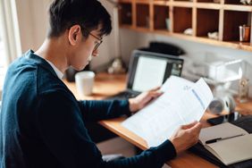 A man works at a desk.