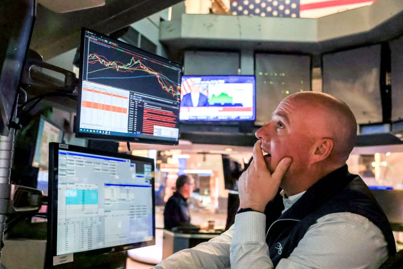 A trader works on the floor of the New York Stock Exchange